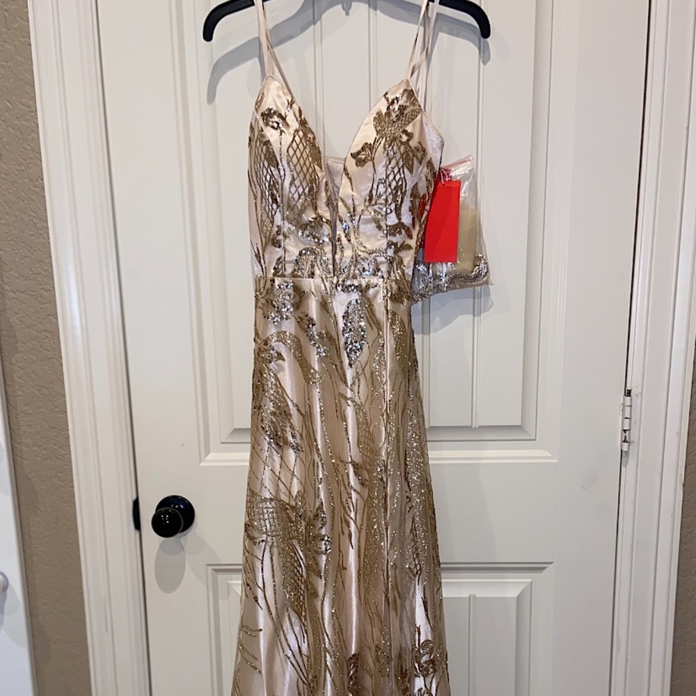 Beautiful NWT rose gold sequin/glitter dress